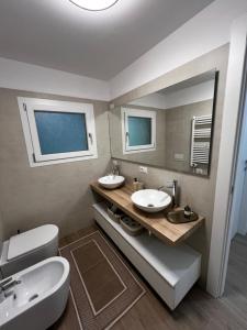 Koupelna v ubytování Jesolo Fronte Mare Pineta - Jl Blue Apartments C7 + 6 fotografií