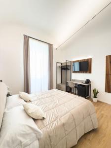 Postel nebo postele na pokoji v ubytování Bianca Guesthouse
