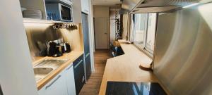 Kuchyňa alebo kuchynka v ubytovaní Appartements - Halles Brauhauban Tarbes