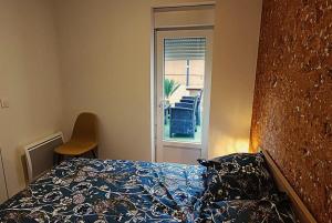 Posteľ alebo postele v izbe v ubytovaní Appartements - Halles Brauhauban Tarbes