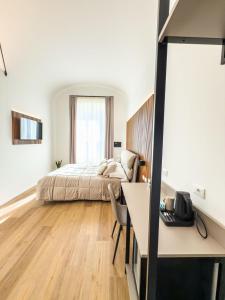 Postel nebo postele na pokoji v ubytování Bianca Guesthouse