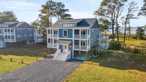 an aerial view of a house with a yard at Wildcat Haven - Waterfront & phenomenal views! in Deep Hole
