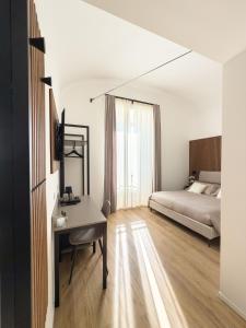 Postel nebo postele na pokoji v ubytování Bianca Guesthouse