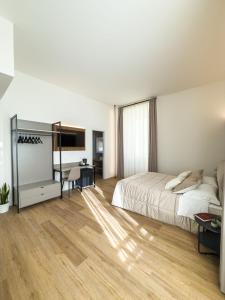 Postel nebo postele na pokoji v ubytování Bianca Guesthouse