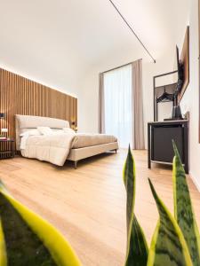 Postel nebo postele na pokoji v ubytování Bianca Guesthouse