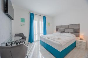 Posteľ alebo postele v izbe v ubytovaní Guest House Arsenal Accommodation