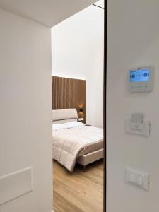 Postel nebo postele na pokoji v ubytování Bianca Guesthouse