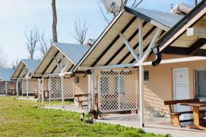 a row of cottages with a roof at Sea Veiw in Shabla +5 photos