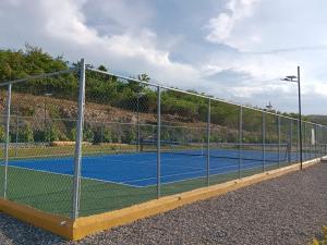Tennis and/or squash facilities at A serene getaway by the oasis or nearby
