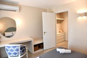 Posteľ alebo postele v izbe v ubytovaní StayBridge Apartments, Mesongi