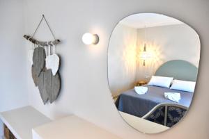 Posteľ alebo postele v izbe v ubytovaní StayBridge Apartments, Mesongi