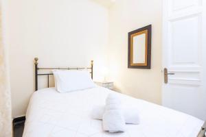 Posteľ alebo postele v izbe v ubytovaní Angiolina Sea View Apartment