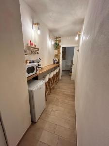 Kuchyň nebo kuchyňský kout v ubytování Castrum Rooms