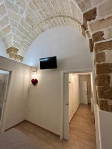 TV a/nebo společenská místnost v ubytování Castrum Rooms