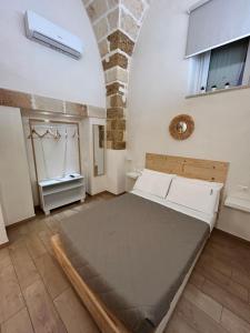 Postel nebo postele na pokoji v ubytování Castrum Rooms