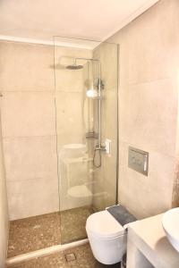Kúpeľňa v ubytovaní StayBridge Apartments, Mesongi
