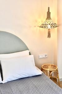 Posteľ alebo postele v izbe v ubytovaní StayBridge Apartments, Mesongi