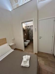 Koupelna v ubytování Castrum Rooms + 15 fotografií