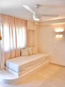 Posteľ alebo postele v izbe v ubytovaní StayBridge Apartments, Mesongi