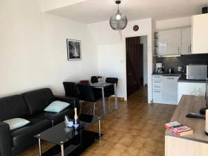 Kuchyňa alebo kuchynka v ubytovaní Résidence Héliovillage - VILLA 4 pers. CAP D'AGDE MAE-2944
