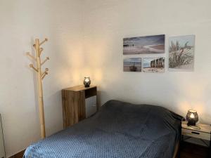 Posteľ alebo postele v izbe v ubytovaní Résidence Héliovillage - VILLA 4 pers. CAP D'AGDE MAE-2944