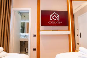 Voodi või voodid majutusasutuse My Way Rooms toas