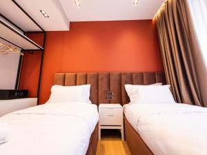 Voodi või voodid majutusasutuse My Way Rooms toas