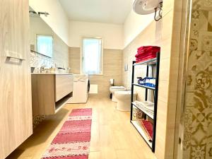 Ένα μπάνιο στο Villa Alghero mare 5 min