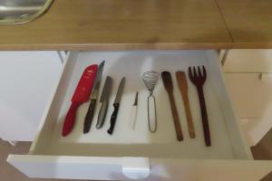 a group of utensils sitting on a shelf at Friendly Footprint in Golden