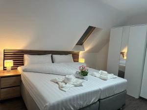 Кровать или кровати в номере Ferienhaus Altenburg