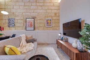 O zonă de relaxare la Boutique Sliema Townhouse with garden