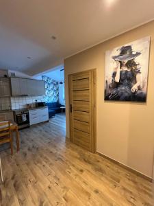 Kuchyň nebo kuchyňský kout v ubytování Luksusowy przestronny apartament + 1 fotografie