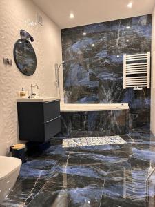 Koupelna v ubytování Luksusowy przestronny apartament