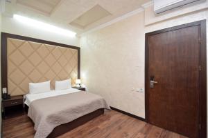 Postel nebo postele na pokoji v ubytování Partez Boutique Hotel