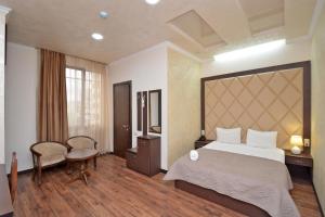 Postel nebo postele na pokoji v ubytování Partez Boutique Hotel