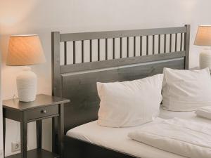 Ein Bett oder Betten in einem Zimmer der Unterkunft "Unnen" in der Alten Schule Greetsiel