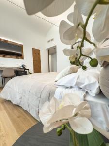 Postel nebo postele na pokoji v ubytování Bianca Guesthouse