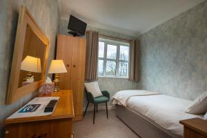 TV a/nebo společenská místnost v ubytování Murphys Farmhouse B&B