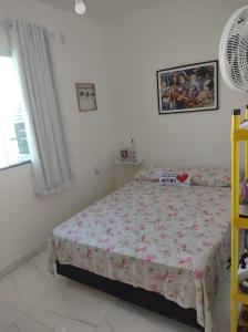 Ένα ή περισσότερα κρεβάτια σε δωμάτιο στο Casa em Jauá