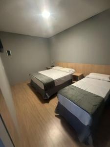 Voodi või voodid majutusasutuse Unity Hotel - Campinas toas