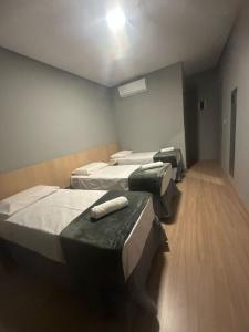 Voodi või voodid majutusasutuse Unity Hotel - Campinas toas