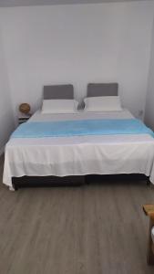 Postel nebo postele na pokoji v ubytování Apartamento El Arrayán + 19 fotografií