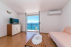 TV a/nebo společenská místnost v ubytování Apartments Gordan