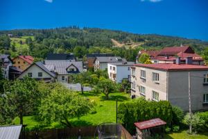 Nespecifikovaný výhled na hory nebo výhled na hory při pohledu z apartmánu