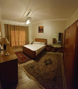 Ένα ή περισσότερα κρεβάτια σε δωμάτιο στο flat in compound wesal