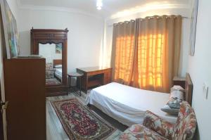 Ένα ή περισσότερα κρεβάτια σε δωμάτιο στο flat in compound wesal +11 φωτογραφίες