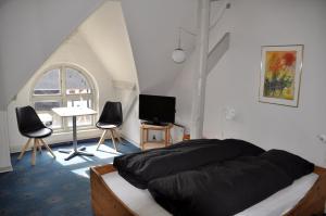 Posezení v ubytování Lundsgaard Bed & Breakfast