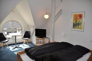 TV a/nebo společenská místnost v ubytování Lundsgaard Bed & Breakfast