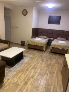 Ένα ή περισσότερα κρεβάτια σε δωμάτιο στο My Place