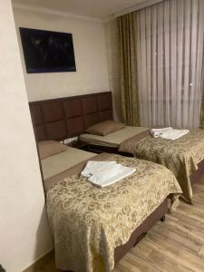 Ένα ή περισσότερα κρεβάτια σε δωμάτιο στο My Place